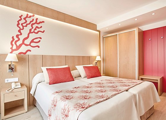 Universal Hotel Perla - Wohnbeispiel Doppelzimmer Bergblick (Zimmercodierung DBB)