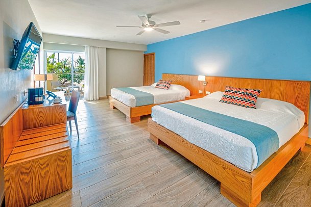 Coral Costa Caribe Beach Resort - Wohnbeispiel Deluxe Room (Zimmercodierung UDM)
