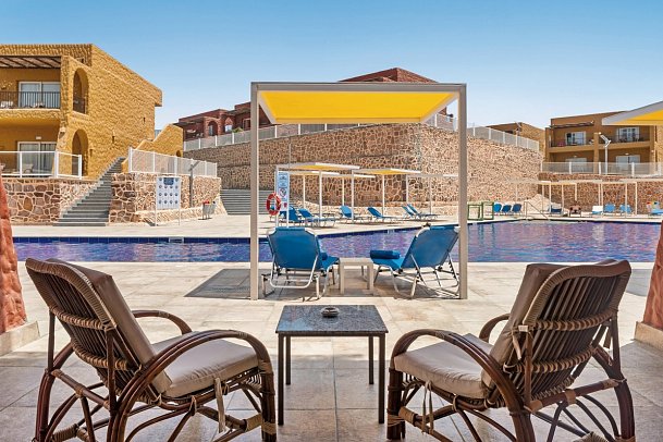 Pickalbatros Portofino Vita Resort - Beispiel Balkon Doppelzimmer Superior Poolblick (Zimmercodierungen DGP & DCP)