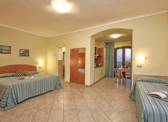 Relais San Rocco - Wohnbeispiel Suite Seeblick und Terrasse (Zimmercodierung SB2)