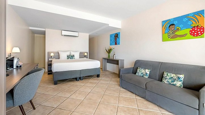 LionsDive Beach Resort - Wohnbeispiel Beachfront Cabana (Zimmercodierung BB1)