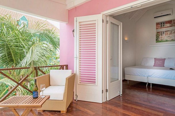 Scuba Lodge Oceanfront Boutique Hotel Curaçao - Wohnbeispiel Deluxe Ocean Room (Zimmercodierung US3)