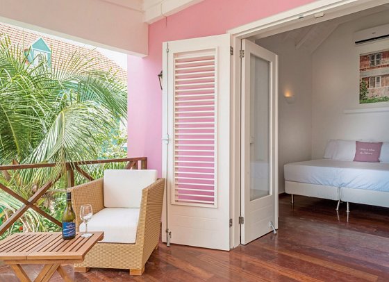 Scuba Lodge Oceanfront Boutique Hotel Curaçao - Wohnbeispiel Deluxe Ocean Room (Zimmercodierung US3)