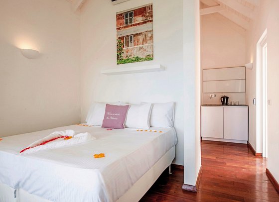 Scuba Lodge Oceanfront Boutique Hotel Curaçao - Wohnbeispiel Deluxe Ocean Room (Zimmercodierung US3)