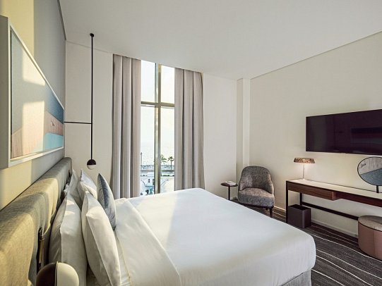 Th8 Palm Dubai Beach Resort, Vignette Collection - Wohnbeispiel Deluxe Room Palm Sea View King (Zimmercodierung DB2)