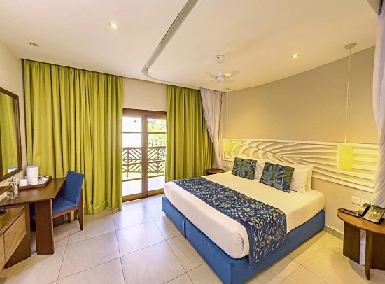 Neptune Village Beach Resort & Spa - Wohnbeispiel Deluxe Sea Side (Zimmercodierung UDC)