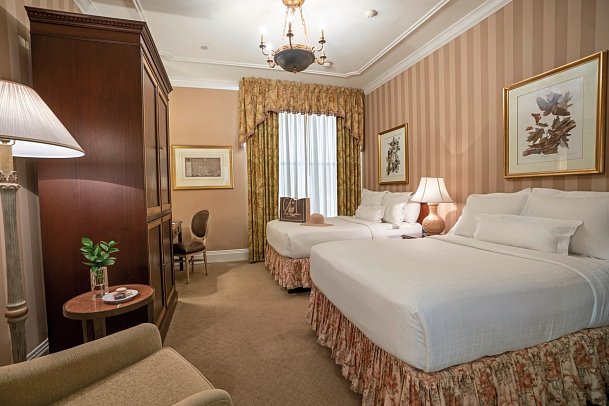 Hotel Monteleone - Wohnbeispiel Traditional Room 2 Double Beds (Zimmercodierung UG3)