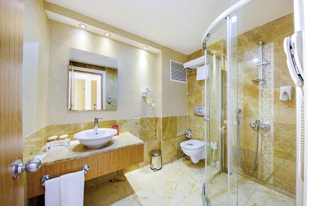 Horus Paradise Luxury Resort - Wohnbeispiel Doppelzimmer Gartenblick Bad