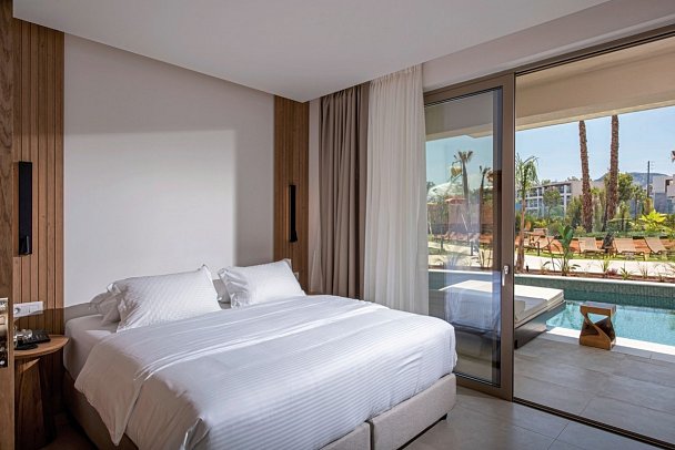 Gouves Water Park Holiday Resort - Wohnbeispiel Familiensuite Gemeinschaftspool (Zimmercodierung WI3)