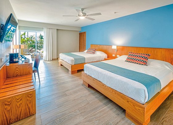 Coral Costa Caribe Beach Resort - Wohnbeispiel Deluxe Room (Zimmercodierung UDM)