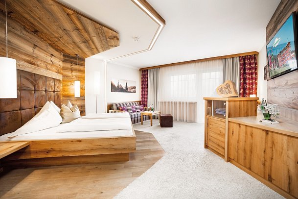 Aktiv- und Wellnesshotel Kohlerhof - Wohnbeispiel Juniorsuite Kuschelsuite (Zimmercodierungen JS1 & WB1)